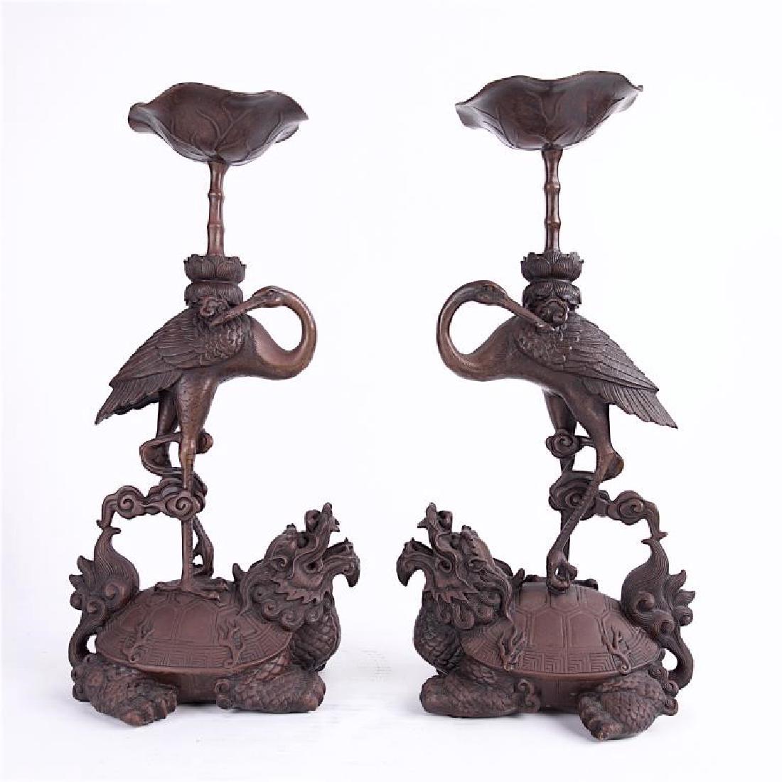 PAIR OF BRONZE CRANE ON TORTOISE CANDLE HOLDERS (1 of 1)