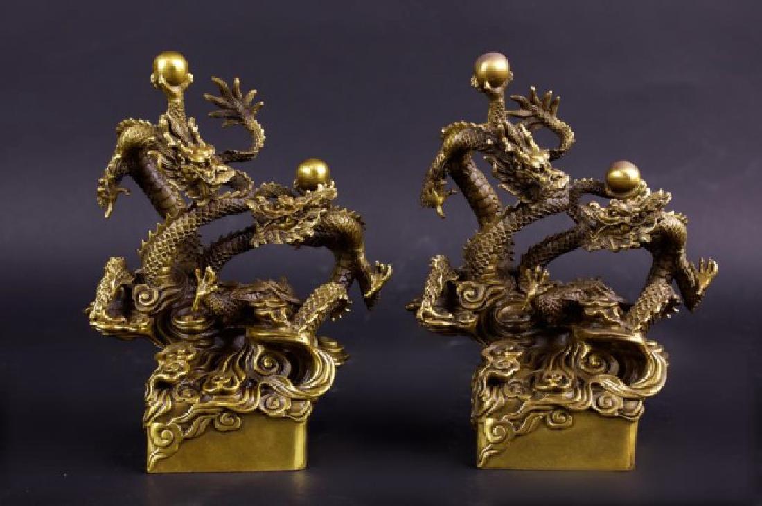 PAIR OF CHINESE BRONZE CARVED DRAGON SEALS: H: 8 in.