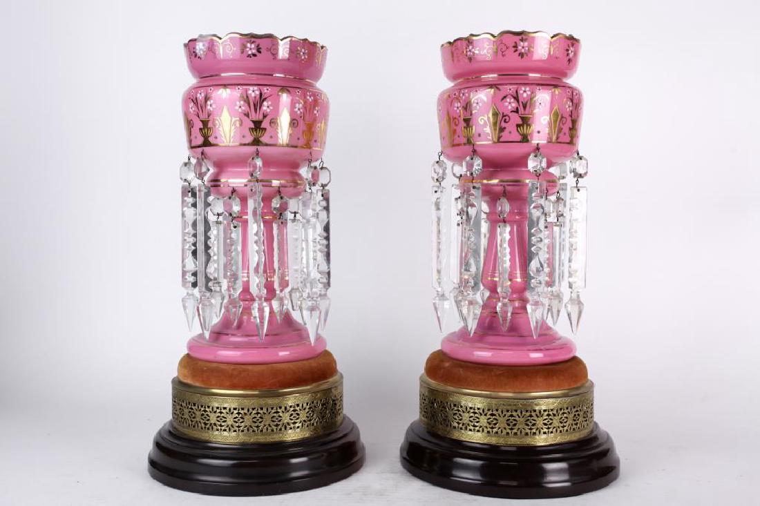 PAIR OF VICTORIAN PINK OPALINE LUSTRE DROP VASES: The ogee tops with waisted bowls to a tapering column, hung with clear cut pendants and decorated with opaque enamel. H: 19 1/2 in.