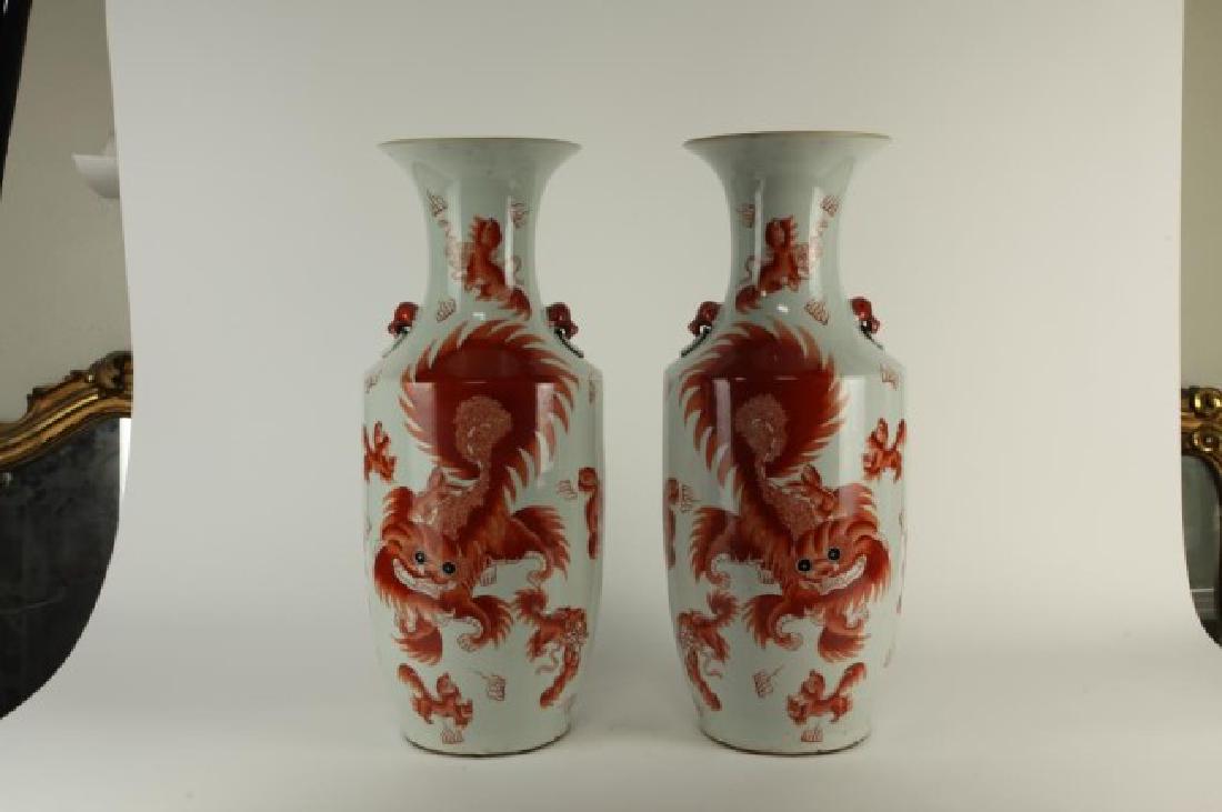 PAIR OF CHINESE IRON RED FOO LION VASES (1 of 4)
