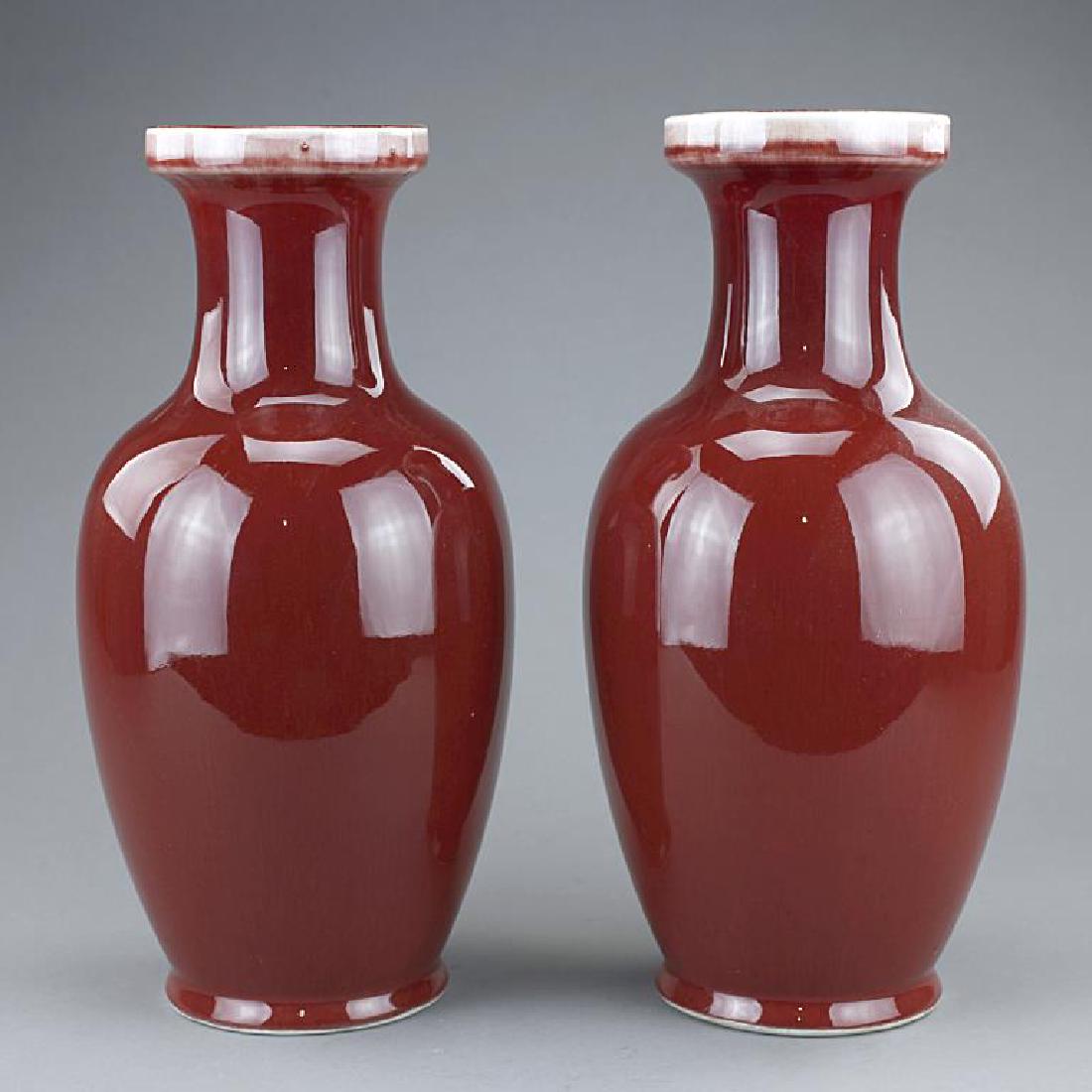 PAIR OF CHINESE RED BALUSTER SHAPED PORCELAIN VASES (1 of 4)
