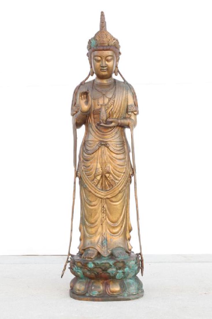 STANDING BRONZE GUAN YIN HOLDING A VASE OF NECTAR (1 of 3)