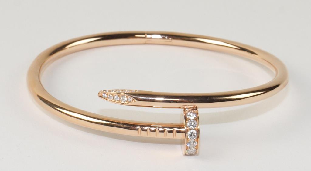18K CARTIER-STYLE ROSEGOLD CUFF WITH DIAMONDS: Size: 17in -18K rose gold size#18 with 0.65 CT dimond