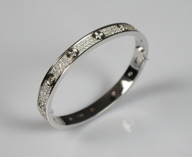 A VINTAGE 18K WHITE GOLD CARTIER-STYLE BANGLE (1 of 4)