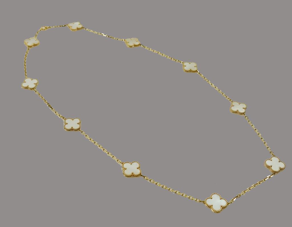 VINTAGE VAN CLEEF & ARPELS STYLE NECKLACE: 18K yellow gold and with mother-of-pearl stations. L: 24 in.