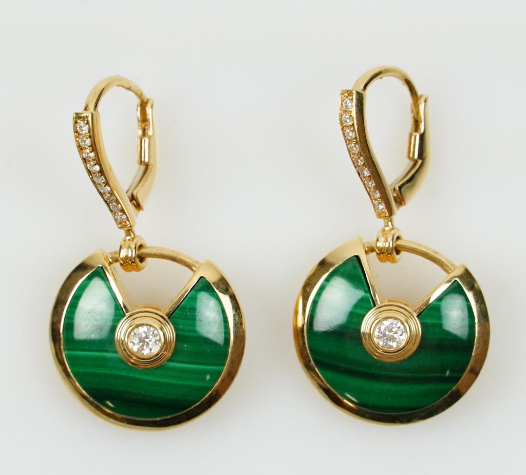 VINTAGE 18K GOLD MALACHITE & DIAMOND EARRINGS: Diamond stud in the middle of green malachite in yellow gold setting.
