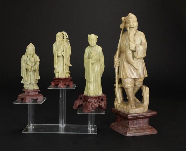 FOUR CHINESE CARVED SOAPSTONE FIGURES ON STANDS (1 of 1)