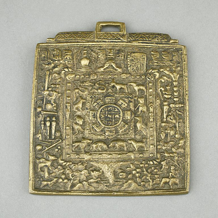 ANTIQUE AND RARE TIBETAN GILT-BRONZE PENDANT (1 of 2)