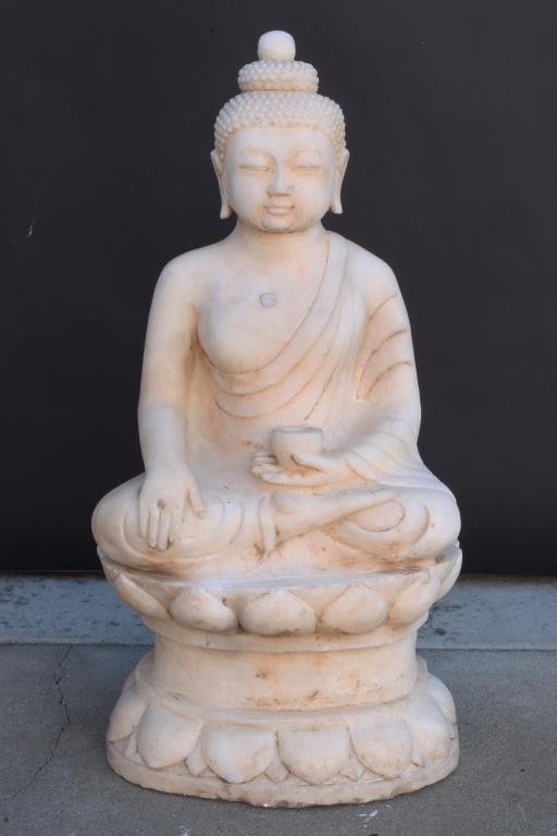 SEATED STONE BUDDHA HOLDING A CUP: Seated in a robe on a double lotus stand. H: 27 in.