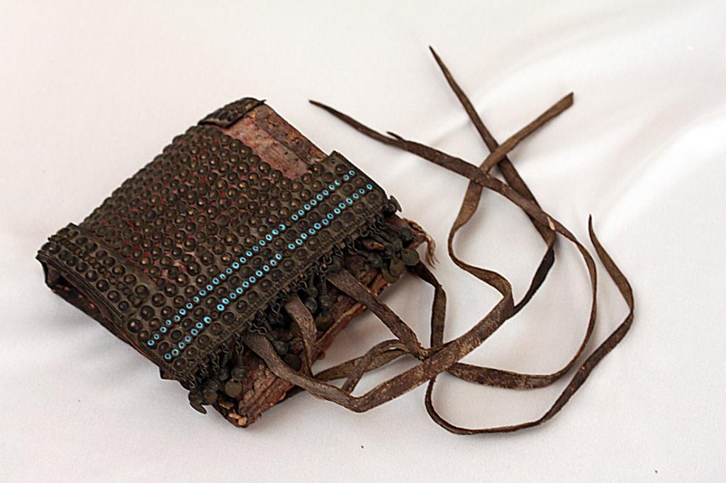 MONGOLIAN MEDICINE CARRIER: With five glass tubes inside the carrier. L:4 1/2 in x W:4 1/2 in.