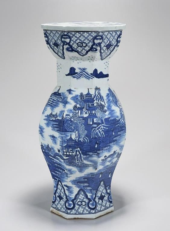 TALL CHINESE BLUE AND WHITE OCTAGONAL GARDEN SEAT: Finely painted around the body with an elaborated landscape. H: 22 in.