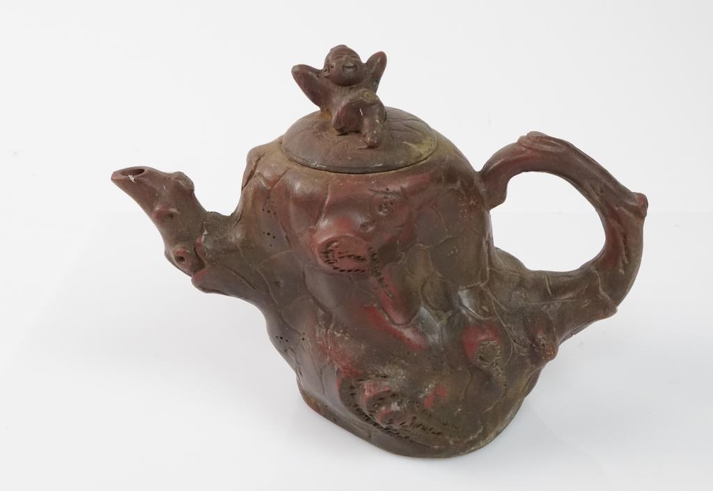 ANTIQUE CHINESE YIXING CLAY TEAPOT: Adorned with a child as filial atop of the lid.