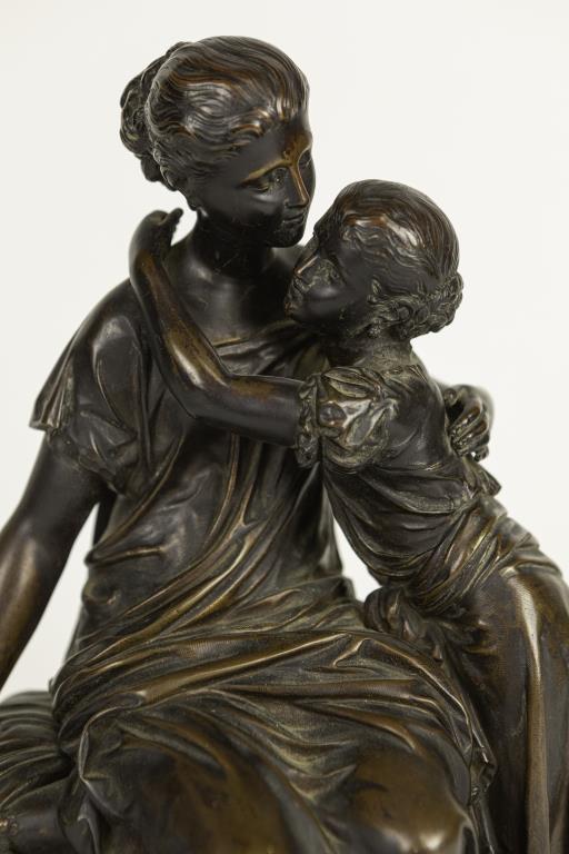 A BRONZE FIGURAL GROUP OF A MOTHER AND A CHILD (1 of 4)