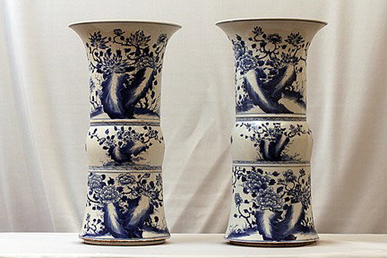 PAIR OF CHINESE BLUE AND WHITE BEAKER VASES: H:16" , bordered in three sections, hand-painted with blossoming branches and birds in flight