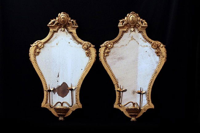 PAIR OF ITALIAN GILT WOOD MIRRORED WALL SCONCES: H:25",18th century, matching antique Italian wall sconces gilt wood frames with original antique mirrors and candle prickets