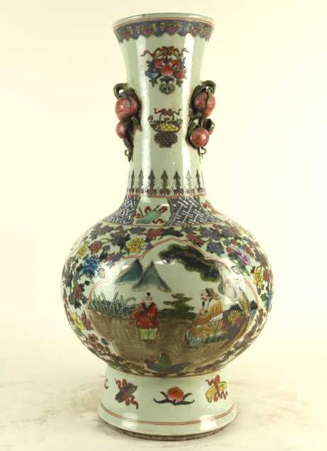 CHINESE BOTTLE VASE OF PEACHES AND FLOWERS: Beautifully painted with panels of figural scene on the bulbous body. Flanked by a long neck, with peaches on two sides. Mark to read Kangxi on the shoulder. H: 27 3/8 in.