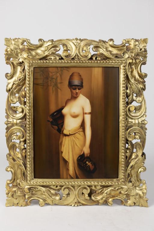 GERMAN PORCELAIN PLAQUE, OF A HALF NAKED BEAUTY: In a beautiful giltwood frame. An impressed mark to read KPM on the back.