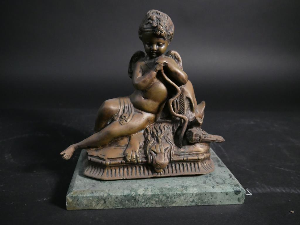 SMALL BRONZE FIGURE OF A PUTTO (1 of 3)