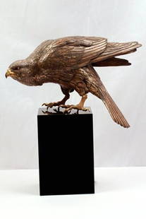 A DETAILED JAPANESE BRONZE SCULPTURE OF AN EAGLE: H: 9 1/2" x L: 14 3/4", Meiji Period, on a marble platform (PLEASE NOTE THAT YOUR PURCHASE COULD BE DELIVERED TO THE ORIGINAL MIAMI BEACH ANTIQUES SHOW ON THE FIRST DAY OF THE EXHIBIT, FEBRUARY 1, 201