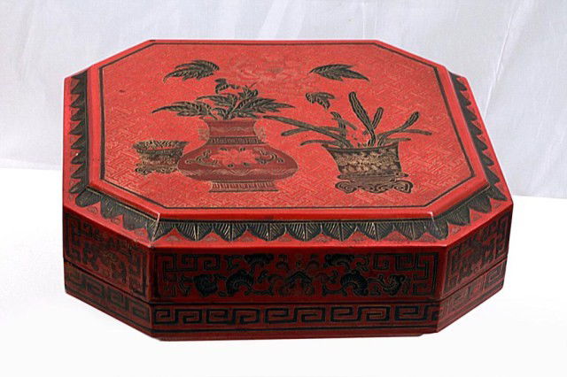 19TH CENTURYCHINESE CINNABAR LACQUER BOX AND COVER: H: 4 1/3" x L: 12 1/2" x W: 12 1/2" with certificate of antiquity by PC Lu and Sons, in Hong Kong 1985