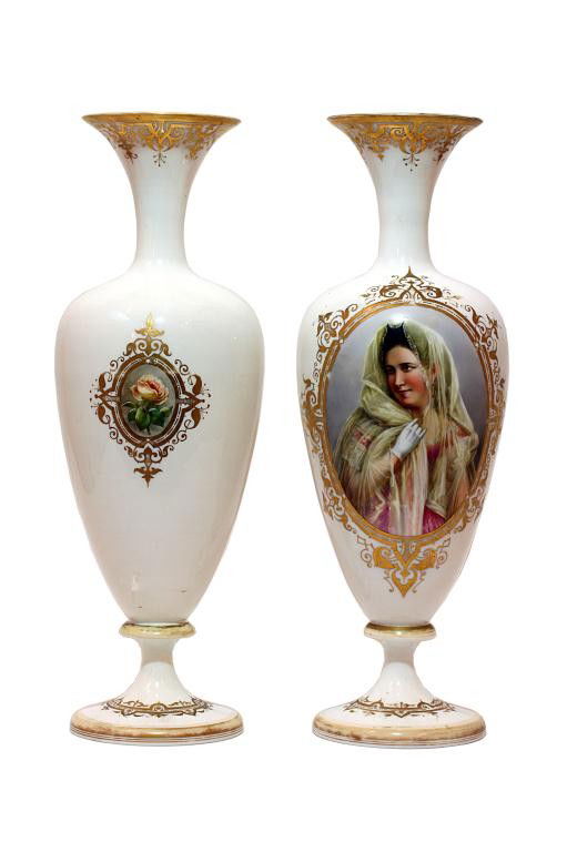 PAIR OF FRENCH OPALINE GLASS PORTRAIT VASES: H: 18 1/2" (47cm), 19th century, of ovoid form and short trumpet neck, each hand-painted with a woman's portrait on one panel and of spring flowers at the back on white ground, gold accents overall, o