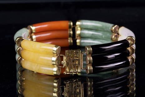 BURMESE JADE BRACELET WITH 14K GOLD: Of different colored jade mounted on 14K gold. chipped