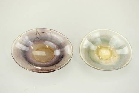 TWO AMETHYST QUARTZ NUT CUPS: Both of asymmetrical form.