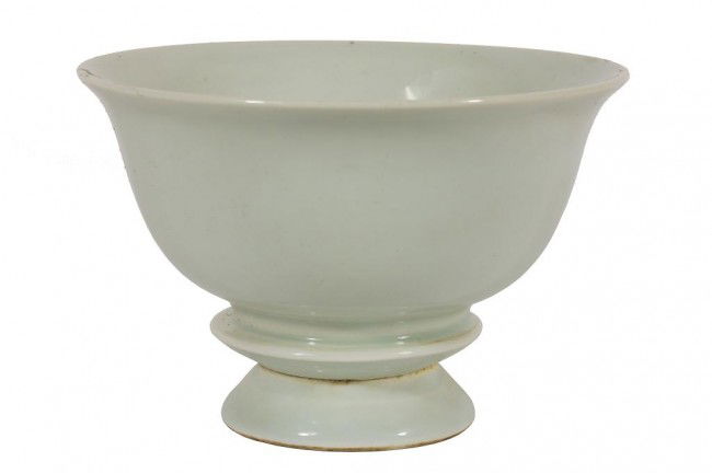 CHINESE ANHUA-DECORATED PORCELAIN STEM BOWL: H: 3 7/8 in. (10cm) x D: 5 3/4 in. (14cm), with broad bowl rising on two-tiered stand, and decorated with a dragon and a phoenix amidst clouds, and with two-character inscriptions at each side (all un