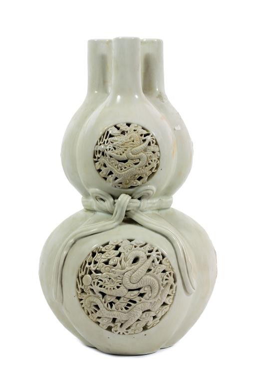 SUPERB TRIPLE SPOUTED DOUBLE GOURD PORCELAIN VASE: H: 12 1/2 in. (31cm), well-potted in the form of three conjoined vases tied by the waist, each lobe reticulated in round panel rendering five-clawed dragon chasing a flaming pearl