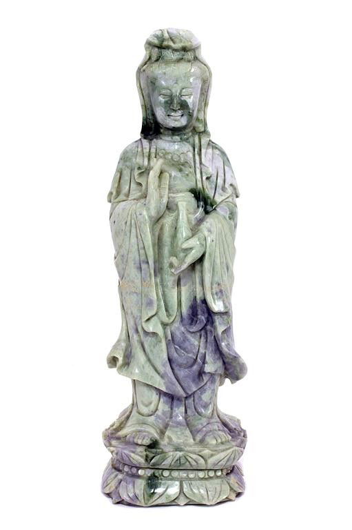 CHINESE JADEITE FIGURE OF A GUANYIN: H: 12 3/4 in. (32cm), standing on a double lotus base wearing her flowing robe, one hand is holding a vase