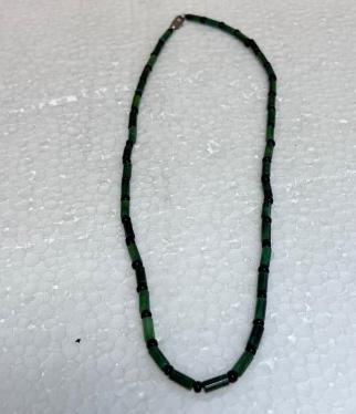 DARK GREEN JADE NECKLACE: Can be worn more of a choker, it has alternating shapes of round and a barrel.