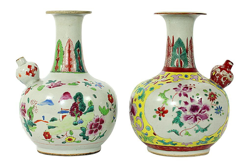 PAIR OF MALAYSIAN WATER VESSELS, LATE 19TH CENTURY: H: 8 1/2 in. (21.5cm), both of bottle form with upright banana leaves by the shoulder to the neck, one globular body hand-painted with village scene and flowers, the other with floral sprays in cartou