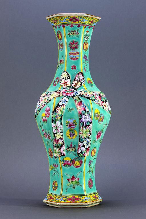 CHINESE REPUBLIC PERIOD HEXAGONAL PORCELAIN VASE: H: 17 7/8 in. (45cm) previously set as a lamp, well molded multi-panel vase with lobed mid section, with vertically aligned moulded blossoms on each sectional panel, and decorated with a bow and ribbo