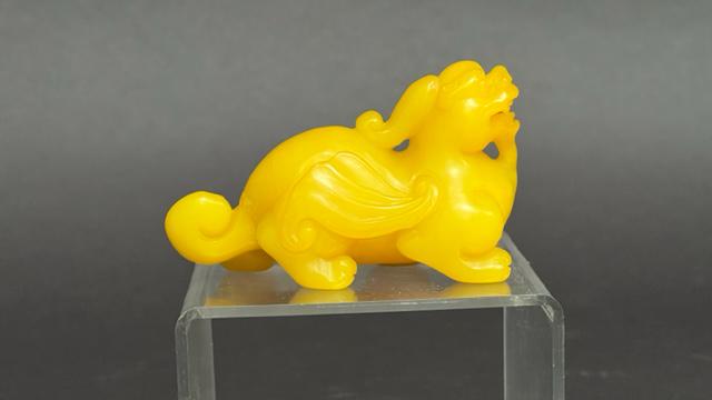 A YELLOW JADE TALISMAN, OF A FOO DOG (1 of 6)