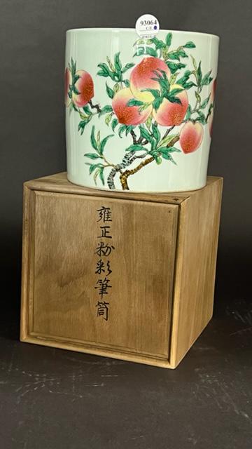 CHINESE PORCELAIN BRUSH POT, OF PEACHES: Depicting peaches and leaves hanging from the branches. Six-character mark on the base to read Yongzheng. With a wooden box. H: 7 1/8 in. D: 7 3/8 in.
