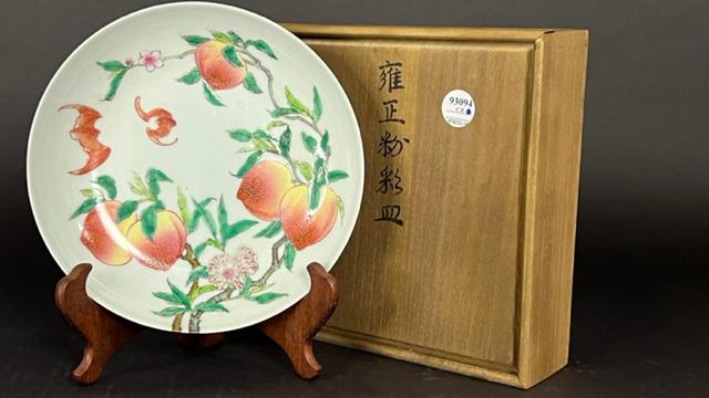 CHINESE PORCELAIN PLATE, OF PEACHES AND BATS: Featuring peaches on the interior and exterior, and with a double-ring six-character mark on the base to read Yongzheng. D: 8 3/4 in.