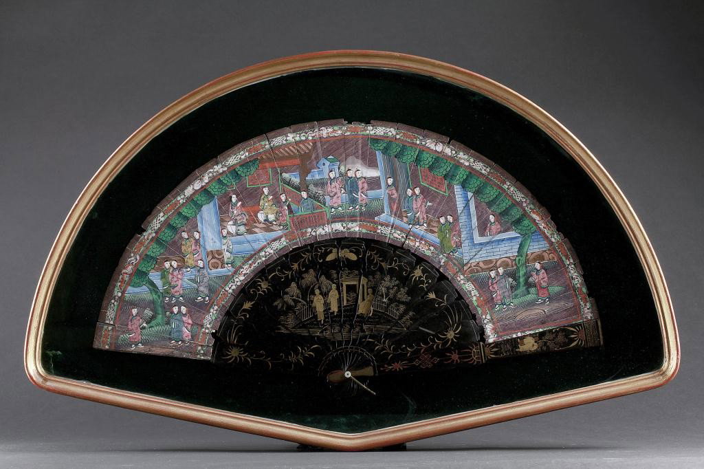 ANTIQUE CHINESE HAND PAINTED FRAMED FAN: Has black lacquer handle with framed gilt painting of a walled garden setting. L: 25 1/4 in.(64cm) x H: 15 1/2 in.(39.5cm), in frame.
