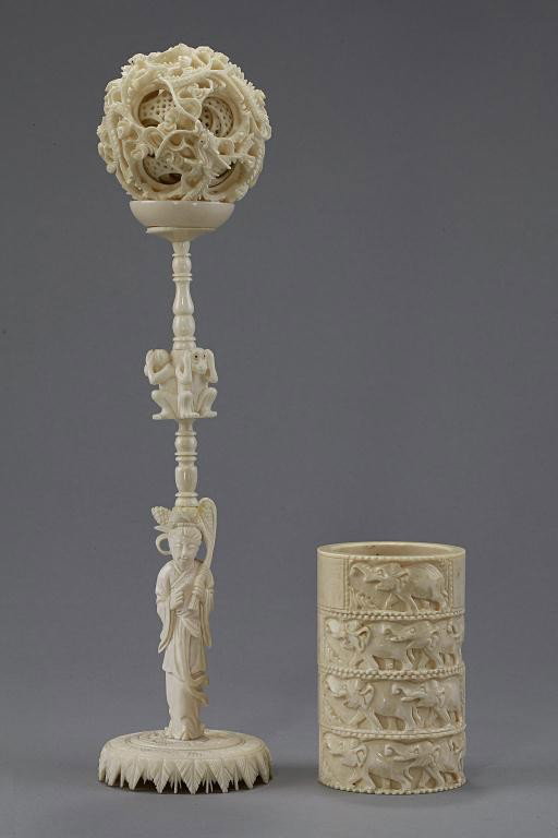 ASSORTED IVORY PIECES, CARVED PUZZLE BALL ON STAND: and four small bangles with elephant carvings. H: 8 in.(20cm)