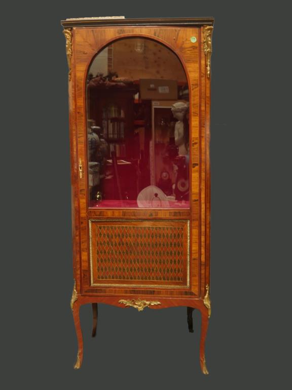 FRENCH 19TH CENTURY VENEERED SHOW CABINET: Mounted and adorned by gilt bronze details, with a cross band panel H: 68 1/4 in.L: 28 1/2 in. W: 16 1/4 in.