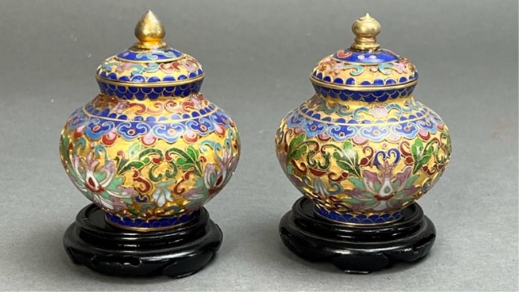 PAIR OF YELLOW GROUND CLOISONNE VASES AND COVER: With bulbous body decorated with sprawling lotus flowers on yellow ground. Cover has matching motif topped with acorn and knob finials.