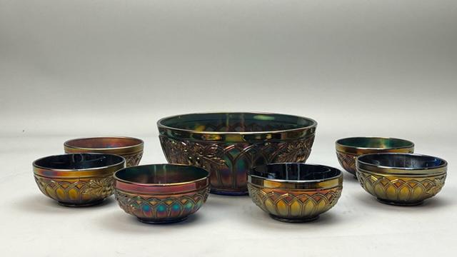 GROUP OF SEVEN TIBETAN SIGNING BOWLS: Comprising of one larger bowl and six smaller bowls.