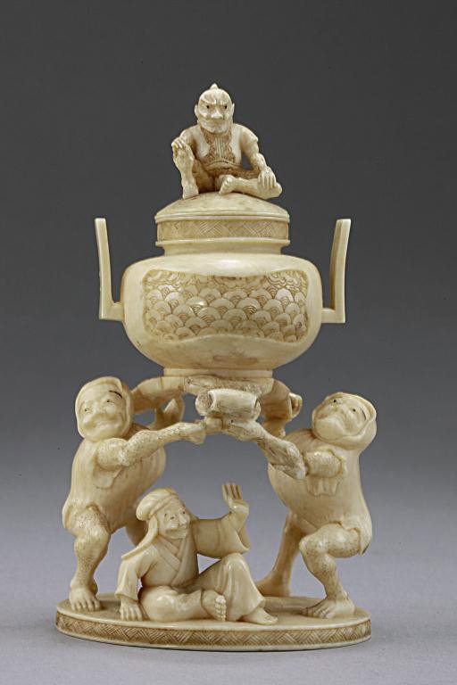 ANTIQUE JAPANESE IVORY NETSUKE OF THREE MEN: From the Private Collection of Harry Lawrence of Laguna Beach. Antique Japanese ivory netsuke of three men which two are carrying a koro, the third man sitting on the ivory base. And top of the lid th