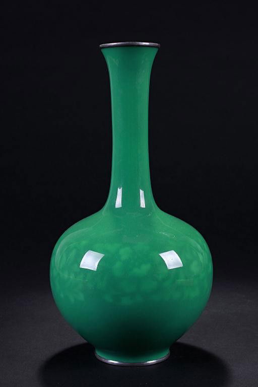 JAPANESE WIRELESS CLOISONNÉ BOTTLE NECK VASE: Of a globular form tapering a long slender neck with a slightly everted mouth designed with blossoms in smoky-effect around the body; with silver rims. H: 9 3/4 in. (25cm).