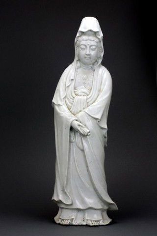 CHINESE BLANC DE CHINE PORCELAIN GUANYIN: Wearing a billowy robe and veil, and holding a scroll on her right hand. H:24 1/2 in. (62cm)