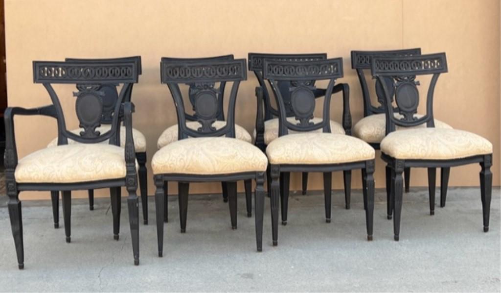 SET OF EIGHT DINING CHAIRS: Each with elegant openwork back panel, armrests and cushioned seat. H: 34 1/2 in.
