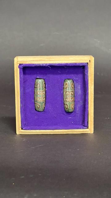 A PAIR OF ANTIQUE CHINESE JADE CEREMONIAL AMULETS (1 of 3)