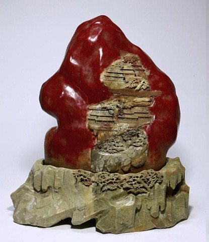 1. LARGE EXQUISITE CHINESE CARVED SOAPSTONE BOULDER: BIDDING FOR THIS LOT WILL START AT 11 AM, PACIFIC TIME. Beautifully carved in high relief on soapstone, possibly of Taishan mountain with temples on slopes beneath trees and behind bushes, mounted on 
