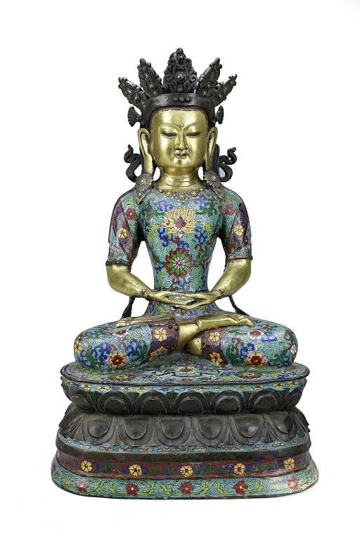 CHINESE CLOISONNÉ FIGURE OF A SEATED GUANYIN: The deity seated in dhyanasana over a double lotus plinth with the hands in dhyana mudra, its hair fashioned into a high chignon behind a five-peak tiara flanked with long pierced ears, the face with