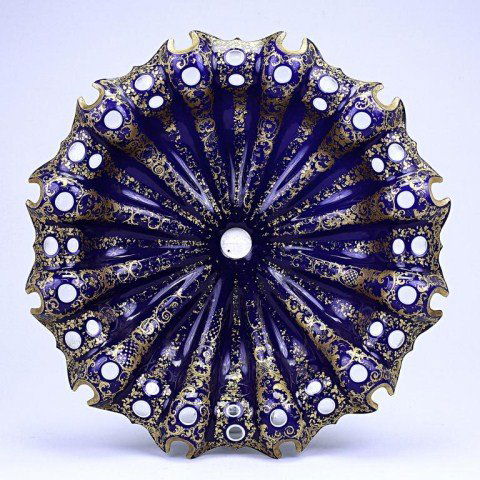 ANTIQUE BOHEMIAN BLUE BACKGROUND, GILT CENTERPIECE: 19th Century, of scalloped rim dish, embellished with a very delicate foliage pattern of gilding over deep blue ground. Diameter: 14 in.(35.5cm)