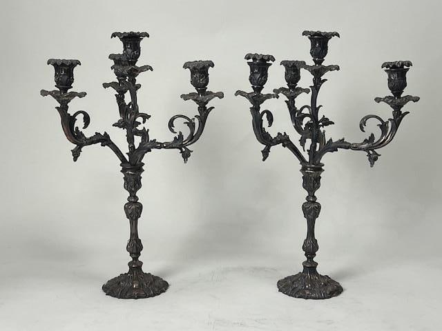 ANTIQUE PAIR OF VICTORIAN CANDELABRA: With a round base, and the entire column, arms, and sconces resembling stemmed roses. H: 16in.
